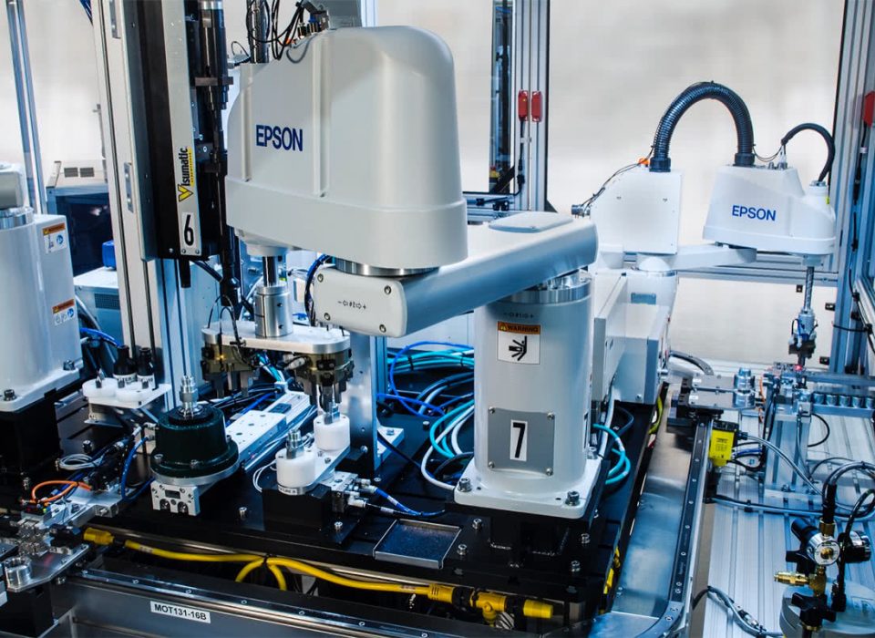 Epson robots loading components into modular assembly machine