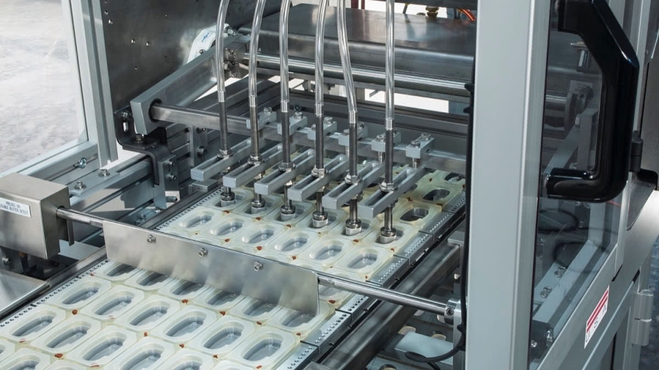 2-mdc-blister-denester-1200 Inline Tray Sealer for Automated Assembly