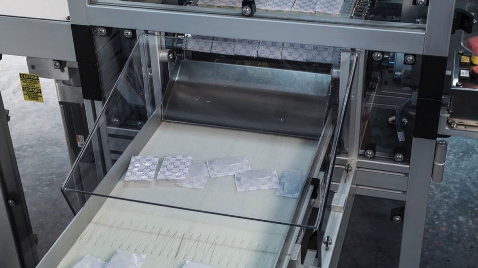 8-mdc-cut-and-perferated-knives-1200 Inline Tray Sealers on Exit Conveyor